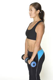The starting position of an upright dumbbell row